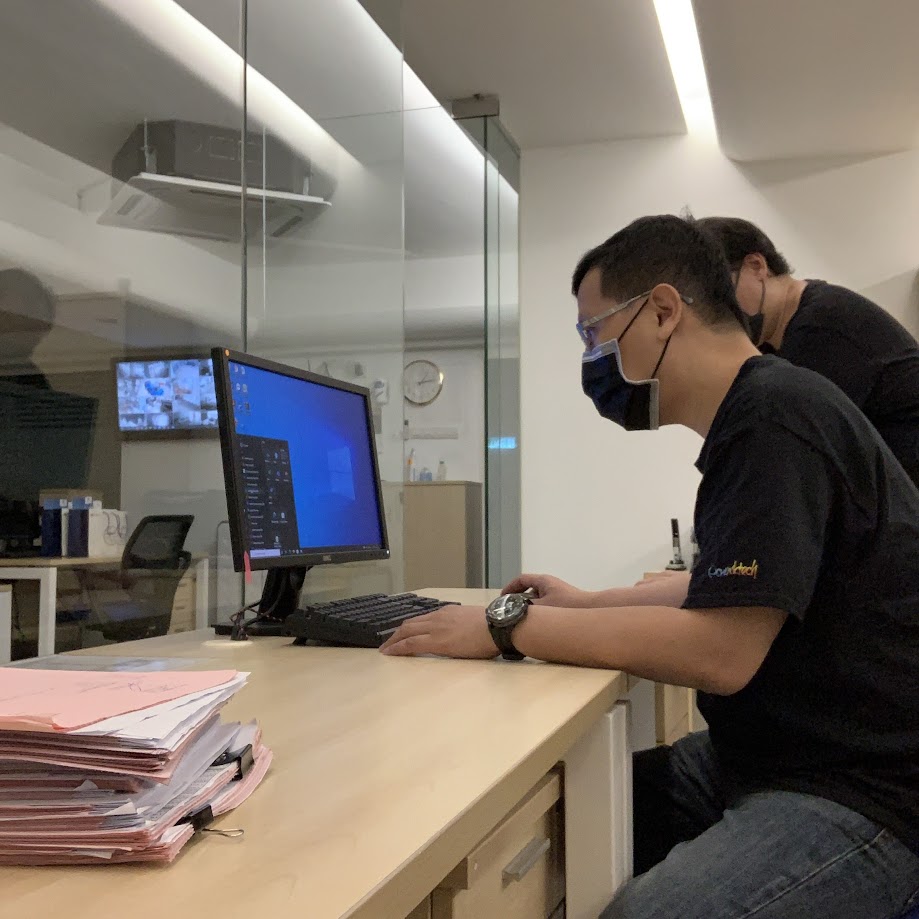 Onsite IT support technician repairing computer in Klang Valley PCWorkTech