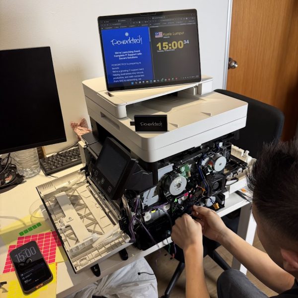 Onsite printer repair service in Kuala Lumpur fixing internal hardware issue for business client